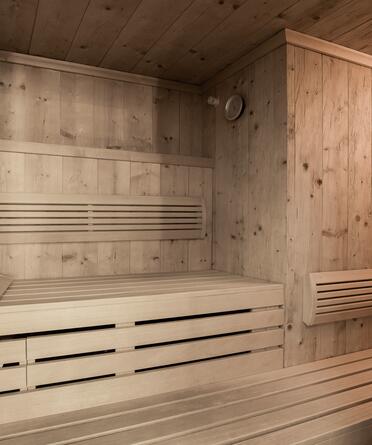  Eine Sauna mit Holzverkleidung und Holzboden, ideal für eine entspannende Auszeit im Salzburger Land.