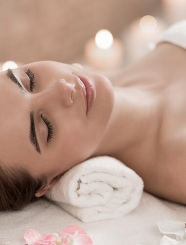 young woman relaxing in the spa area